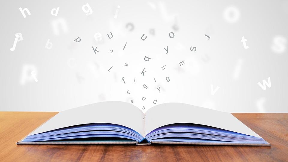 A book with various letters and characters flying out of the pages. Poems for kids can be very popular.